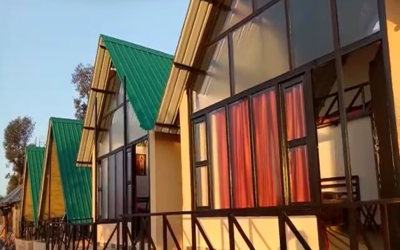 Row of modern A-frame cottages with private balconies