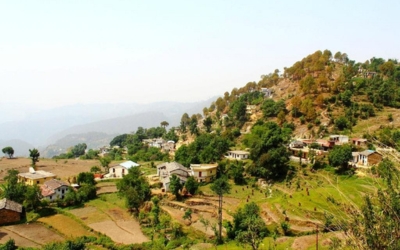View of a picturesque mountain village nestled in the hills