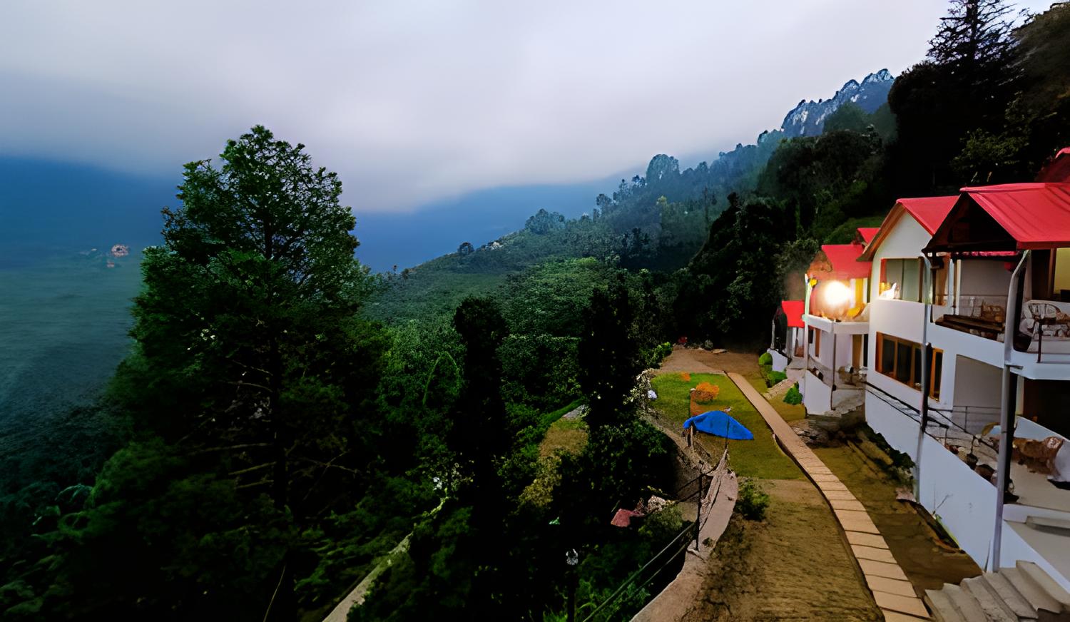 Exterior view of Hidden Trails resort nestled in the Himalayan foothills of Ramgarh