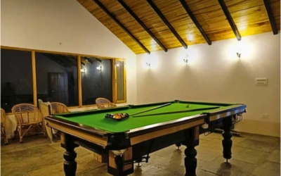 Indoor recreation room with a pool table